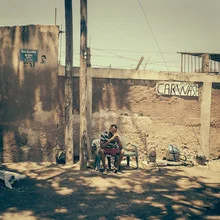 Photo art by Dennis Wehrmann: Street in Mafalala, Maputo, capturing vibrant daily life.