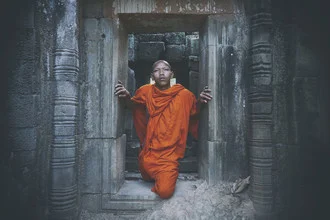 Photo art of a monk in Cambodia, peaceful aura and gentle colors.