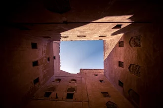 Photo art by Eva Stadler: View of Jabreen Castle in Oman under soft lighting.