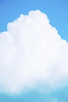 Photographic depiction of soft blue clouds in the sky.