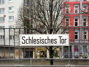 Photo of Schlesisches Tor in Berlin, showcasing the entrance to the subway station.