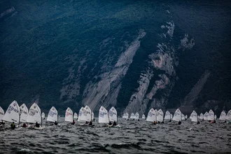 Photo art by Sebastian Rost: sailboats on Lake Garda at sunset