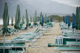 Photo art by Jürgen Gross: calm beach with umbrellas in the off-season