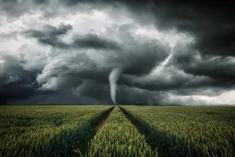 Photo art by Oliver Henze: atmospheric landscape with an approaching tornado