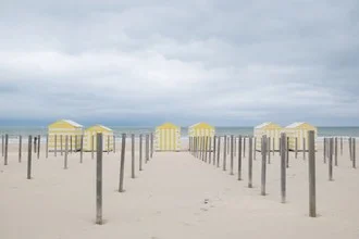 Photo art by Ariane Coerper: beach houses on the Belgian coast under clouds.