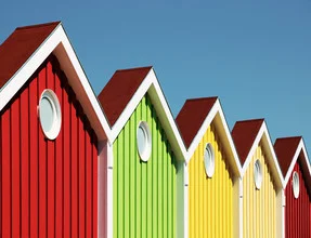 Colorful photo art featuring zigzag-shaped roofs and windows.