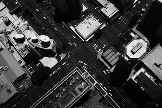 Photo art: Aerial view of Auckland in black and white, showcasing the city from a bird's perspective.
