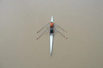 Photo art by Caterina Theoharidou: rower on calm water at sunset