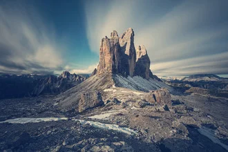 Photo art by Franz Sussbauer: profile view of Tre Cime under a blue sky
