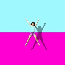 Colorful photo art by Pascal Krumm: happy woman jumping