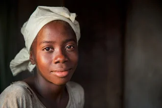 Photo art by Miro May: girl with glowing face at sunset