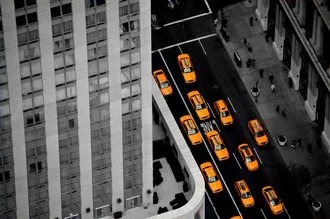 Photo art by Michael Stoll: yellow cabs in a bustling cityscape