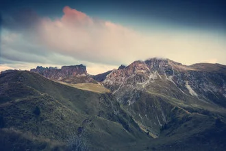 Photo art by Franz Sussbauer: serene mountain landscape under a cloudy sky