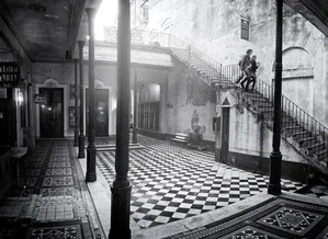 Photo art by Rob van Kessel: Courtyard with staircase in Buenos Aires, black and white image.