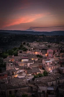Calm landscape with smoking Etna in the background and gentle hills