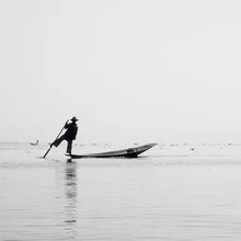 Photo art by Nina Papiorek: fisherman on Inle Lake at sunset