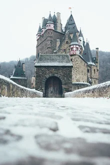 Photo art by Patrick Monatsberger: Eltz Castle in winter snow with a calm atmosphere
