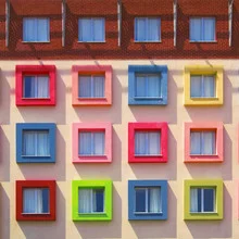 Colorful facade of a house resembling a circus, urban style.