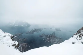 Photo art by Felix Finger: Fog envelops Norway's coast with mountains in the background.