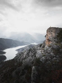 Photo art by Frithjof Hamacher: human in nature with mountains and lake