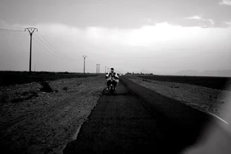 Photo art by Julia Hafenscher: race drivers in the Moroccan desert