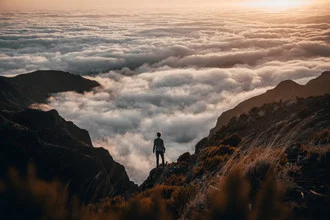 Photo art by Johannes Hulsch: a wanderer above a sea of fog in Portugal