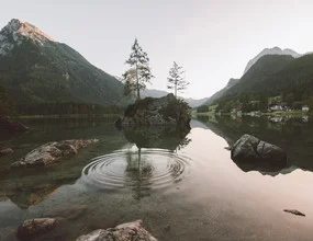 Photo art by Quentin Strohmeier: soft colors of a calm lake at sunrise.