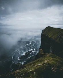 Photo art: mystical coastal landscape of the Faroe Islands with fog and clouds