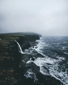 Photo art by Dorian Baumann: Waves and fog along the coast of the Faroe Islands