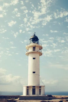 Photo art of a lighthouse at Cap de Barbaria, soft light and calm sea mood.
