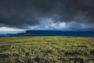 Photo art by Philip Gunkel: serene landscape with green fields and clouds in Iceland