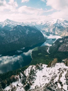 Beautiful view of Lake Königssee with snow-covered mountains in the background.