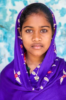 Portrait of a face with gentle eyes and a warm expression