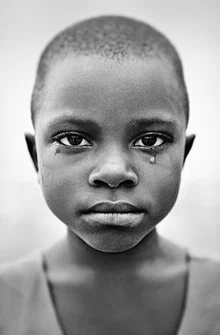 Photo art by Victoria Knobloch: a sad Ugandan girl with tears in her eyes.