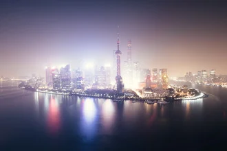Photo art by Roman Becker: lights of the Pudong skyline at night in Shanghai.