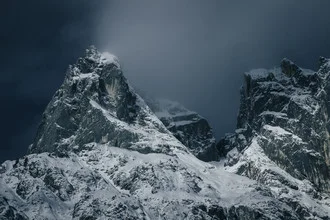 Photo art by Melanie Hinderberger: mountain chain with soft clouds and snowy peaks