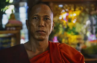 Photo art by Martin Seeliger: calm monk with a serene expression in Myanmar