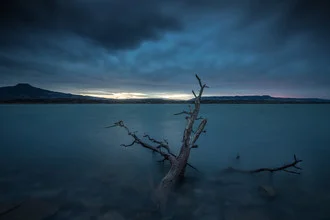 Photo art by Sebastian Worm: calm lake with clouds in the background