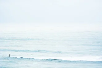 Photo art by Tal Paz-fridman: Surfer in stormy waves at the winter coast