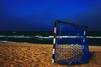 Photo art by Dirk Fricke: empty beach with a soccer ball and blue sky