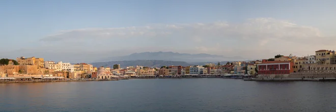 Photo art by Dennis Wehrmann: Sunset over the harbor of Chania in Crete.
