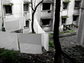 Photo art: View of Chongqing city with houses and laundry in the suburbs