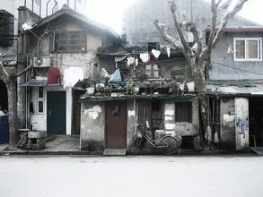 Photo art: small urban houses in Shanghai with laundry hanging out