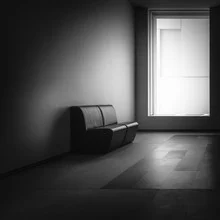 Photo art by Björn Witt: minimalist black and white scene featuring a chair