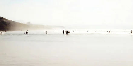 Beautiful photo art by Karl Johansson: life on the beach with surfers in the ocean.