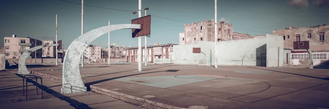 Photo art by Franz Sussbauer: basketball court in Havana, urban playground under sunlight