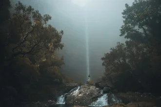 Photo art by Tiago Sales: calm scene with fog over a lagoon surrounded by trees