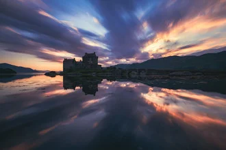 Photo art by Jean Claude Castor: Eilean Donan Castle beneath a picturesque sky