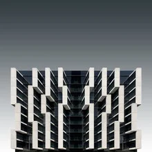 Photo art by Pau Iglesias: modern architecture featuring a reflective skyscraper in Barcelona.