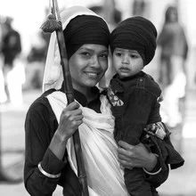 Photo art by Jagdev Singh: spontaneous mothers with a warm smile